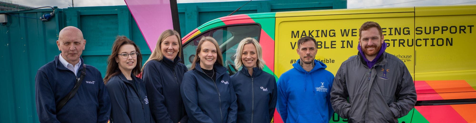 Sunderland colleagues and members of the Lighthouse Charity standing next to their van.